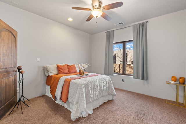 carpeted bedroom featuring ceiling fan