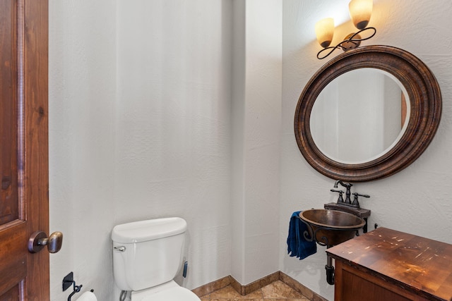 bathroom with tile patterned floors and toilet