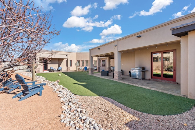 view of yard with a patio area