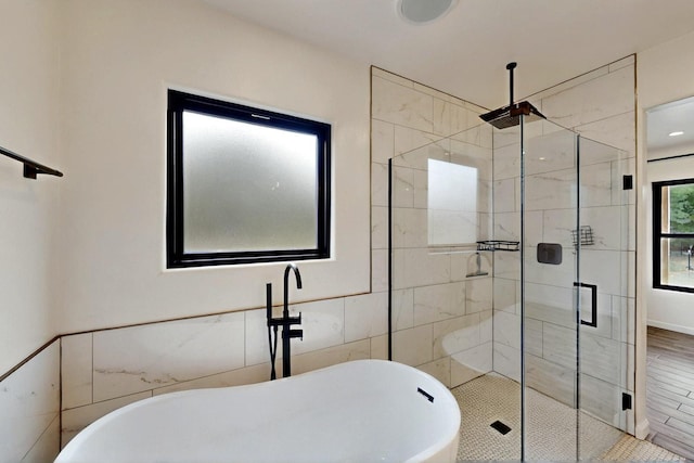 450 Juan Tomas Rd, Tijeras, NM 87059 - bathroom featuring a stall shower and a soaking tub