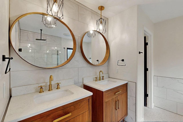 450 Juan Tomas Rd, Tijeras, NM 87059 - full bath featuring tile walls, two vanities, and a stall shower
