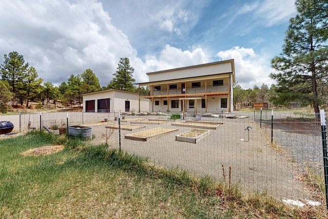 450 Juan Tomas Rd, Tijeras, NM 87059 - rear view of property featuring a vegetable garden