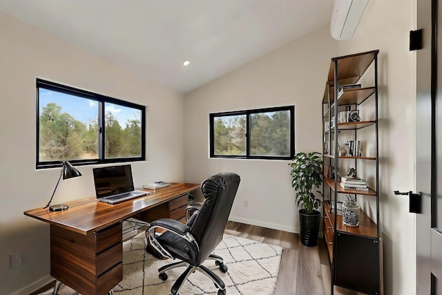 450 Juan Tomas Rd, Tijeras, NM 87059 - office space featuring plenty of natural light, wood finished floors, lofted ceiling, and a wall unit AC