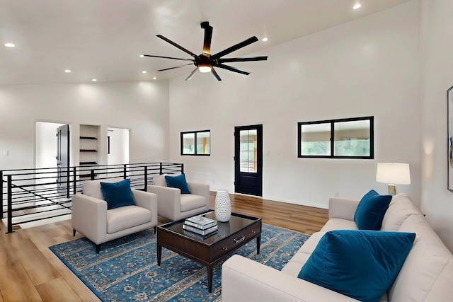 450 Juan Tomas Rd, Tijeras, NM 87059 - living room with ceiling fan, wood finished floors, recessed lighting, and high vaulted ceiling
