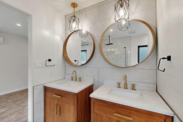450 Juan Tomas Rd, Tijeras, NM 87059 - full bath featuring two vanities, walk in shower, and wood finished floors