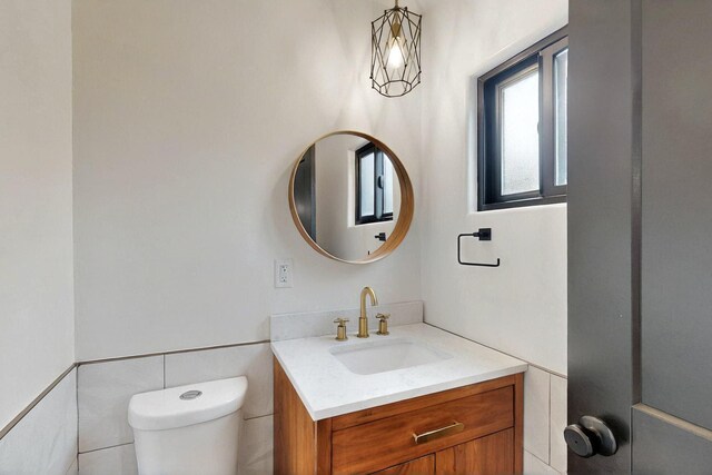 450 Juan Tomas Rd, Tijeras, NM 87059 - half bath featuring toilet and vanity