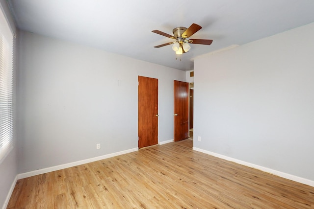 unfurnished room with light hardwood / wood-style floors and ceiling fan