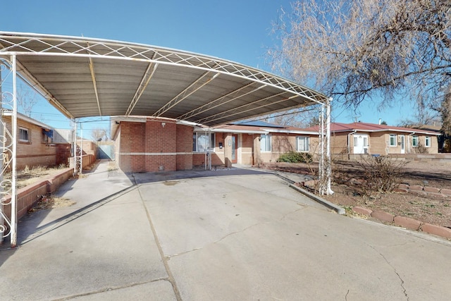 view of car parking with a carport