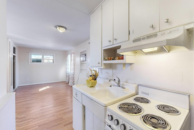 kitchen with white cabinetry, white electric stove, sink, and light wood-type flooring