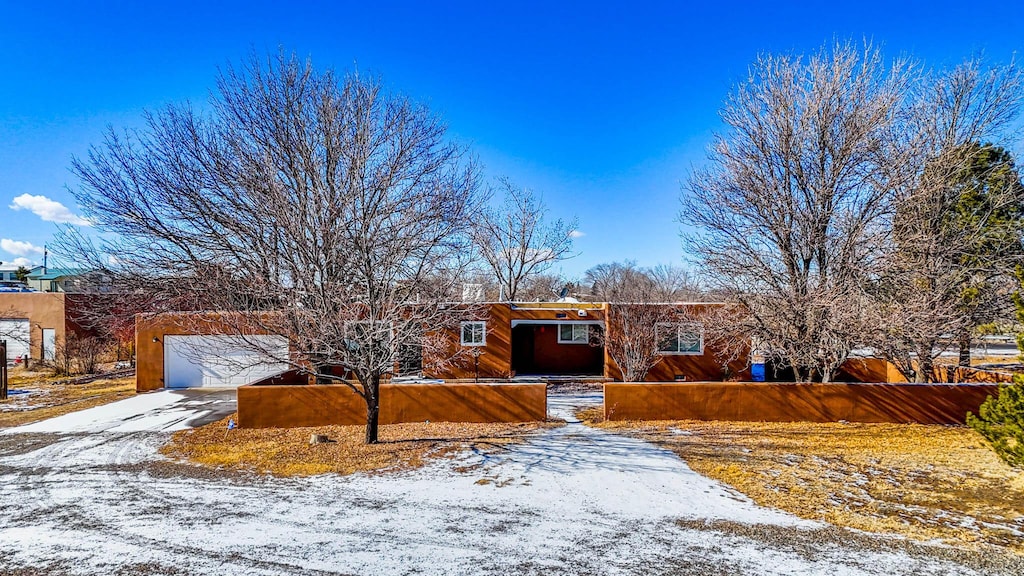 view of front of home with a garage