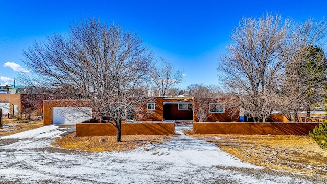 view of front of home with a garage