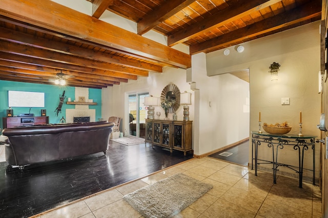 reception featuring ceiling fan and a fireplace