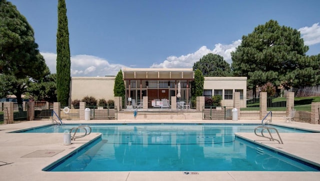 view of pool featuring a patio