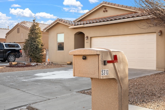 view of front of home featuring a garage