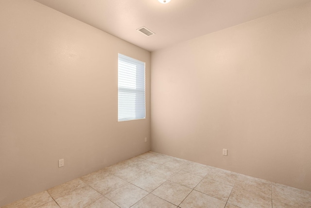 view of tiled spare room