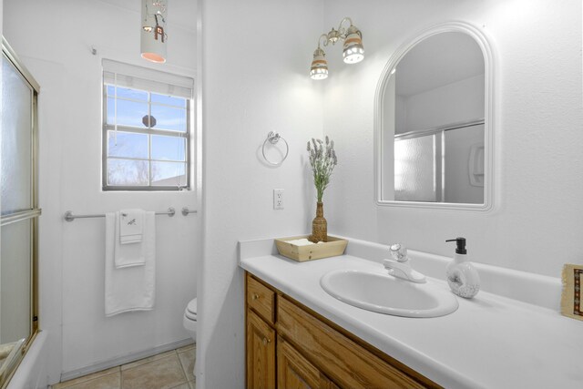 1 Blackberry Ln, Los Lunas, NM 87031 - full bathroom featuring tile patterned floors, vanity, and toilet