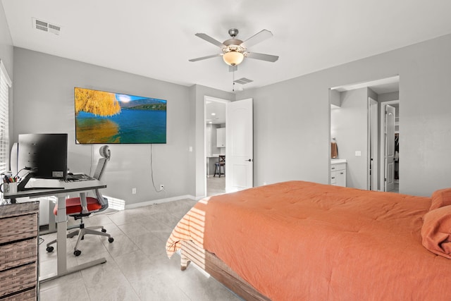 tiled bedroom featuring connected bathroom and ceiling fan