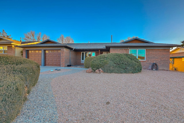 ranch-style home with a garage