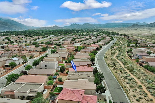 drone / aerial view featuring a mountain view