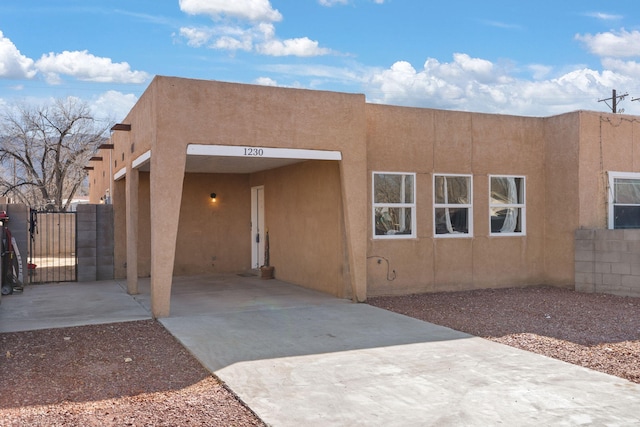 exterior space featuring a carport