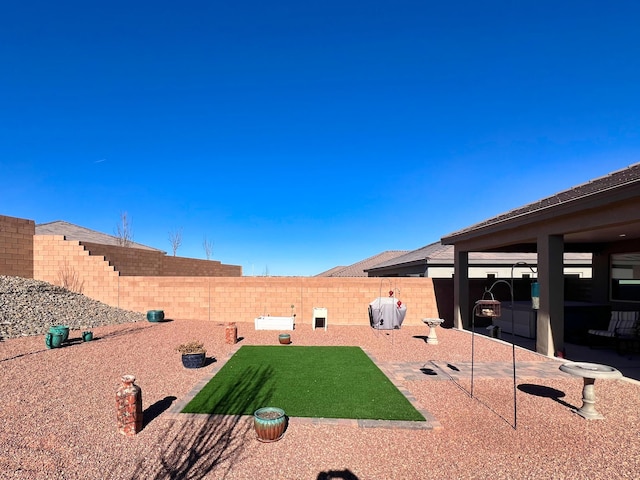 view of yard with a patio area