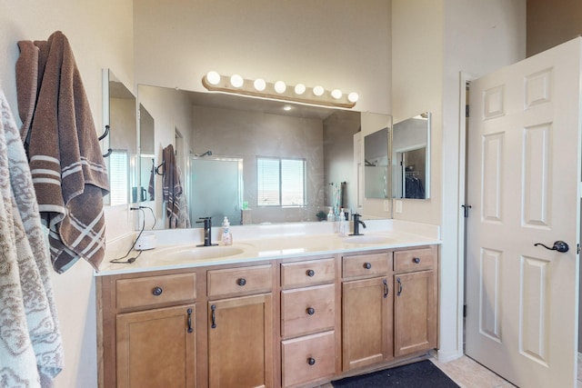 bathroom with double vanity and a sink