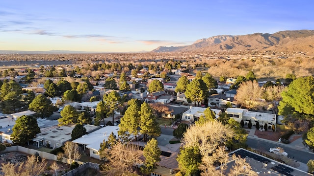 aerial view at dusk with a mountain view