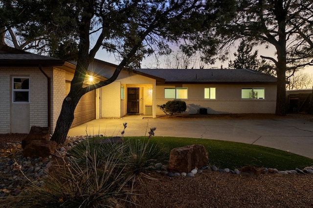 ranch-style home with a garage