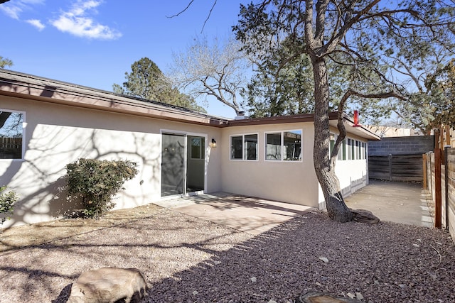 rear view of house featuring a patio