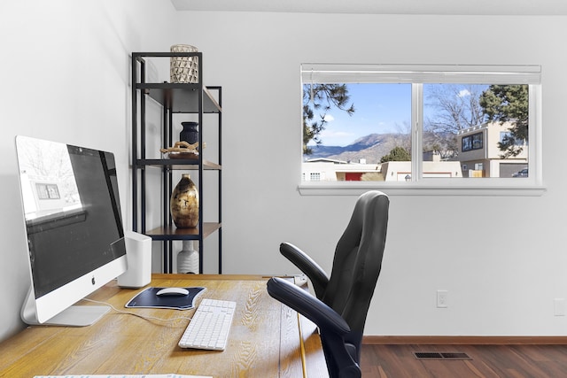 home office featuring hardwood / wood-style flooring