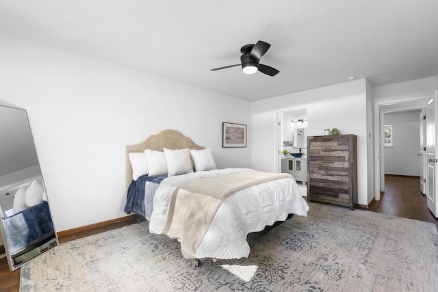 bedroom with ceiling fan and dark hardwood / wood-style flooring