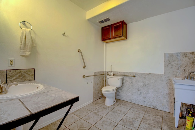 bathroom featuring tile patterned flooring, vanity, and toilet