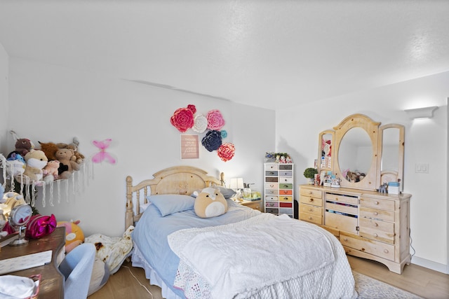 bedroom featuring light hardwood / wood-style floors