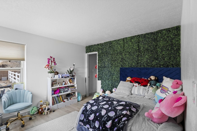 bedroom featuring light hardwood / wood-style floors