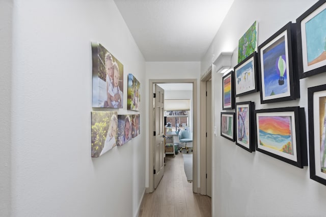 corridor featuring light wood-type flooring