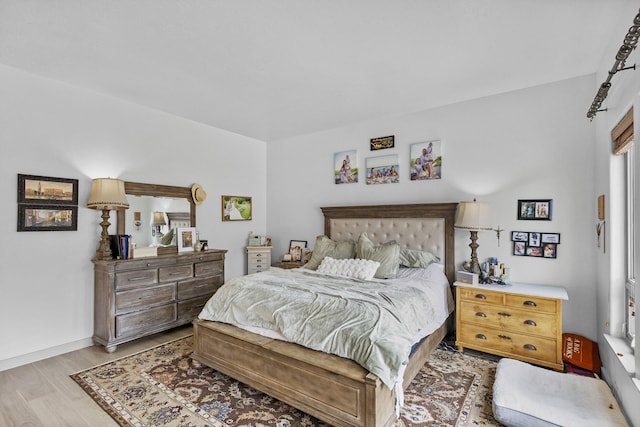 bedroom featuring light hardwood / wood-style floors