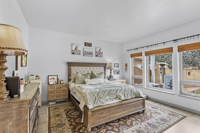 bedroom featuring light hardwood / wood-style floors