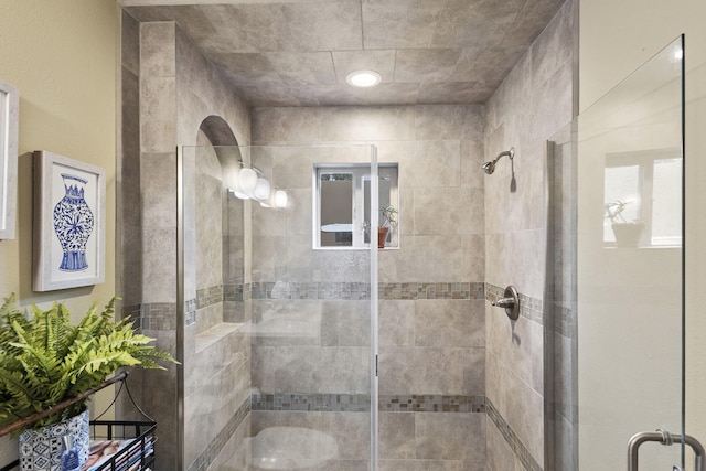 bathroom featuring an enclosed shower