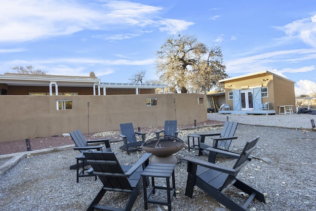 view of patio with an outdoor fire pit