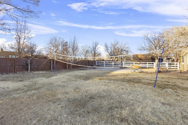 view of yard featuring volleyball court