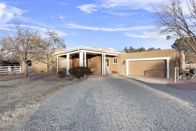 view of front of home with a garage