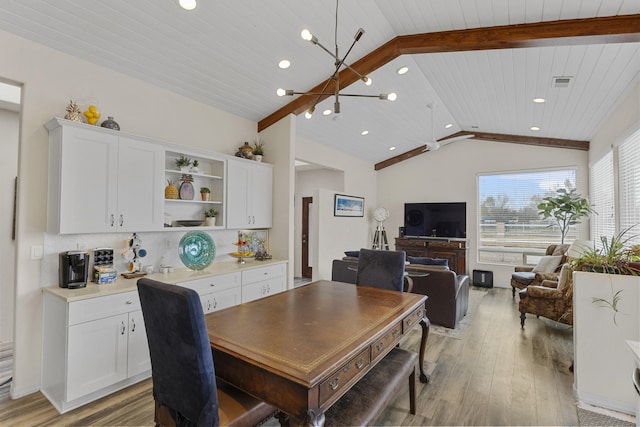 dining space featuring an inviting chandelier, lofted ceiling, light hardwood / wood-style flooring, and wooden ceiling