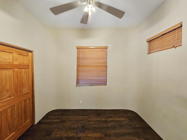 empty room featuring wood finished floors and ceiling fan