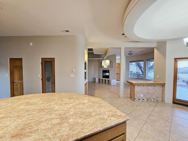 kitchen featuring visible vents and light tile patterned floors