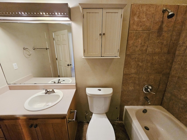 full bathroom with vanity, tiled shower / bath, and toilet