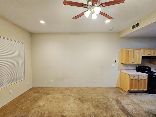 kitchen with ceiling fan, black range with gas cooktop, and light carpet