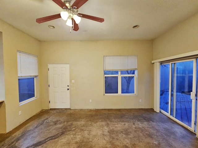 unfurnished room featuring ceiling fan