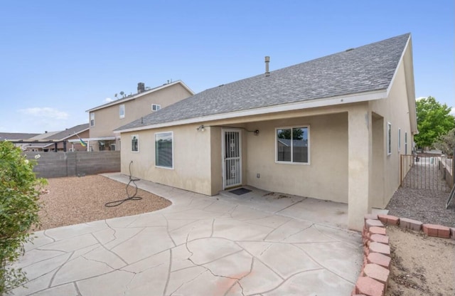 rear view of house with a patio area