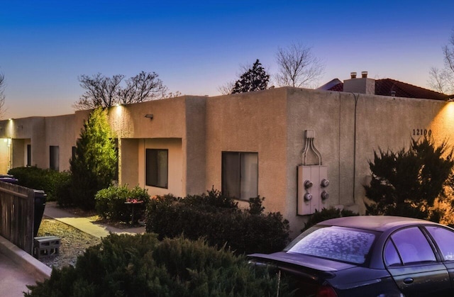 view of property exterior at dusk