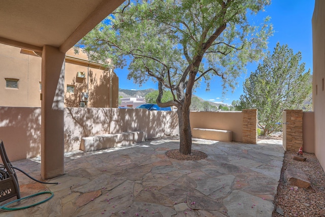 view of patio with a mountain view